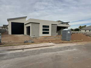 View of front facade with a garage