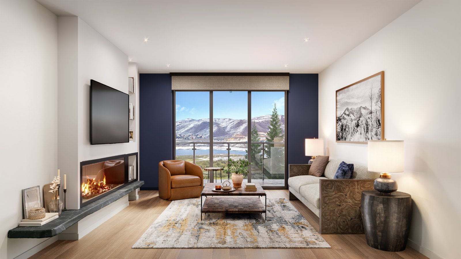 Living room with a water and mountain view and light hardwood / wood-style flooring
