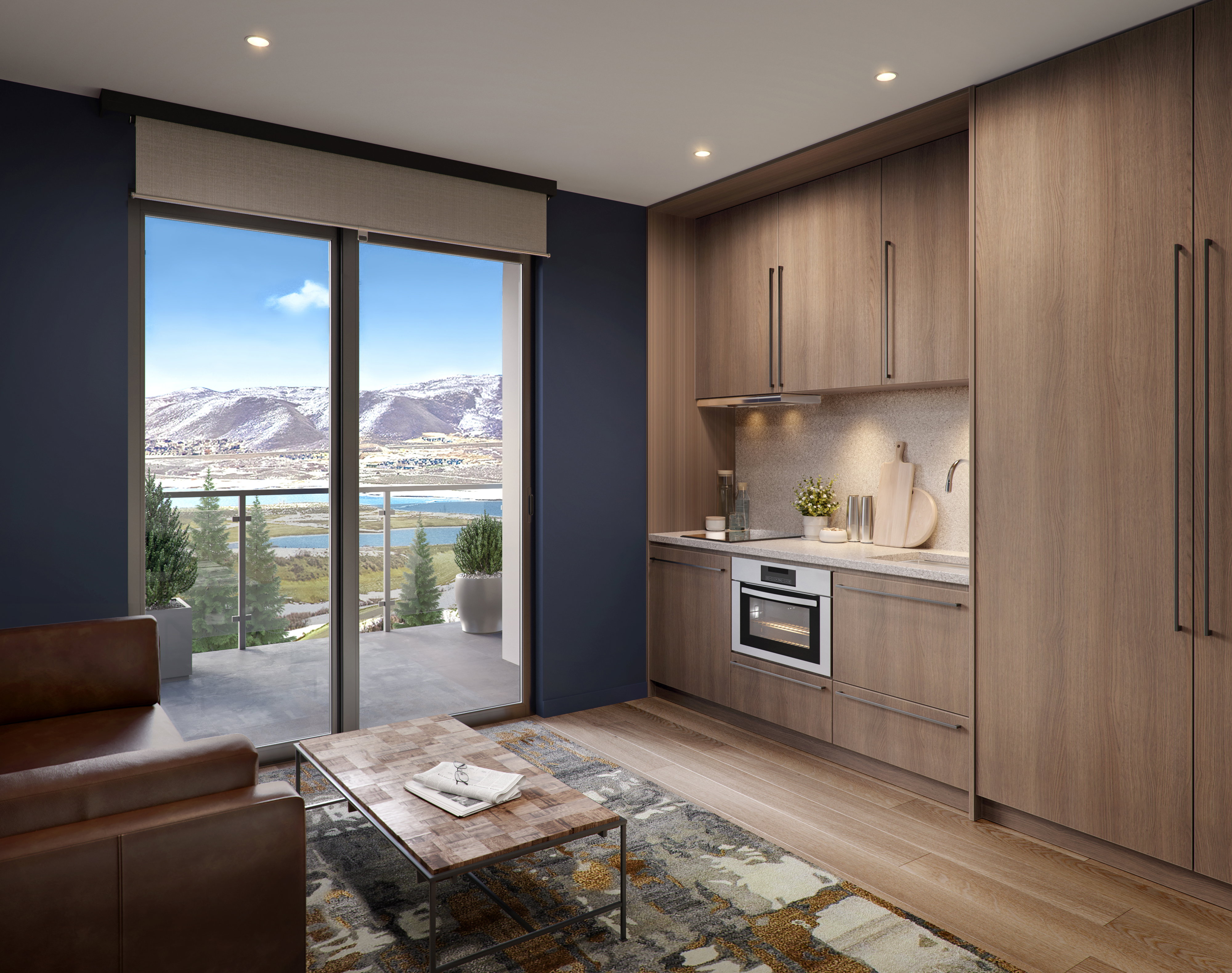Living room featuring sink, plenty of natural light, light hardwood / wood-style floors, and a mountain view