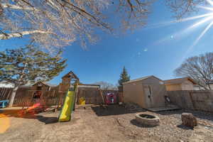 View of play area with a shed