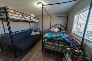 Bedroom featuring hardwood / wood-style flooring