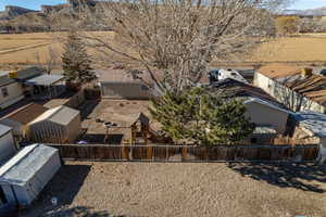 Birds eye view of property featuring a mountain view