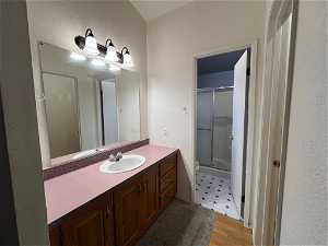 Master Bathroom with vanity, and an enclosed shower