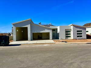 Contemporary house featuring a garage