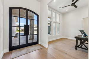 Foyer entrance featuring recessed lighting, baseboards, ceiling fan, and wood finished floors