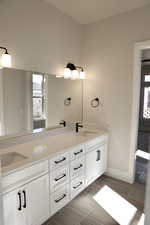 Bathroom with a healthy amount of sunlight and vanity