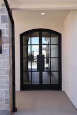 Doorway to property with french doors