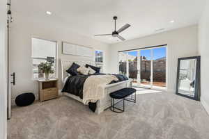 Carpeted bedroom featuring visible vents, access to exterior, baseboards, ceiling fan, and recessed lighting
