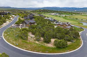 Birds eye view of property with a mountain view