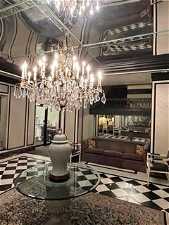 Main Lobby 3 with Original Black/White Marble Tile Floors and Walls/Glass Chandelier