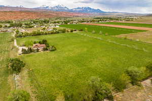 Drone / aerial view with a mountain view and a rural view