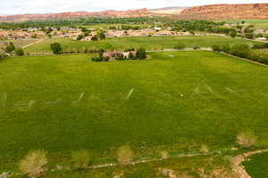 Drone / aerial view featuring a rural view and a mountain view