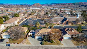 Birds eye view of property with a mountain view