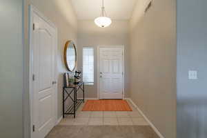 View of carpeted foyer