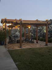 View of yard with a patio and a pergola