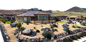 View of front of property featuring a mountain view