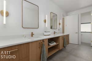 Bathroom with tile floors and dual vanity