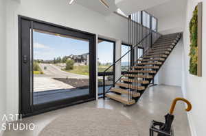 Entrance foyer with concrete floors