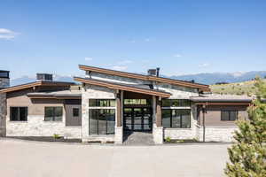 Exterior space featuring a patio and a mountain view