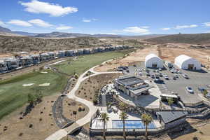 Birds eye view of property featuring a mountain view