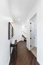 Corridor featuring dark hardwood / wood-style flooring