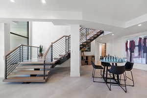 Dining area with light tile flooring