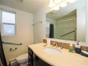 Bathroom with vanity and toilet