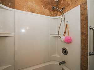Bathroom featuring  shower combination