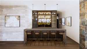 Bar featuring hanging light fixtures and dark hardwood / wood-style flooring