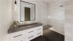 Bathroom with large vanity, tile walls, and tile flooring