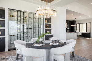 Dining room featuring a notable chandelier and hardwood / wood-style floors