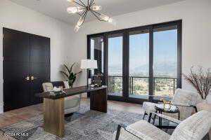 Office area with an inviting chandelier