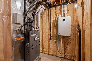 Utility Room with Tankless Water heater