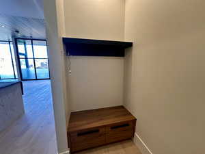 Mudroom with light wood-type flooring