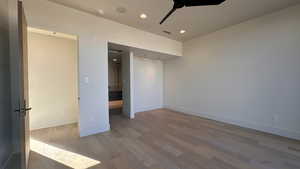 Unfurnished bedroom featuring light wood-type flooring