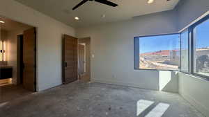 Unfurnished bedroom featuring ceiling fan