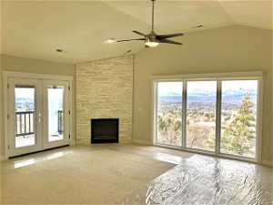 Family room off kitchen area with fireplace and valley views