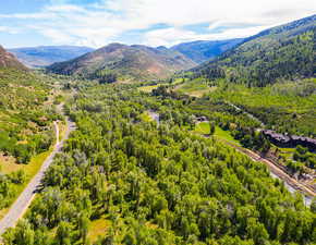 Aerial view featuring a mountain view