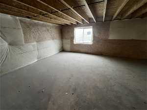 Unfurnished room featuring concrete floors