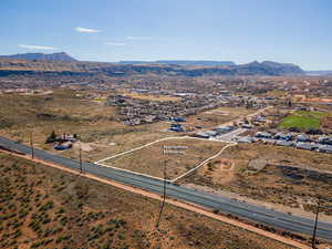 Birds eye view of property featuring a mountain view