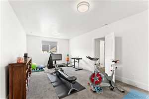 Exercise room with carpet floors