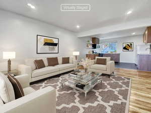 Living room featuring light hardwood / wood-style flooring