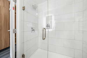 Bathroom featuring a shower stall