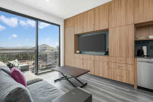 Living room with light wood-style floors