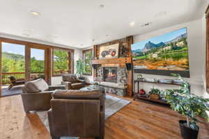 Living room featuring a fireplace and hardwood / wood-style flooring