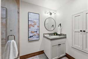 Bathroom with tile flooring and large vanity
