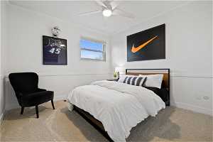 Bedroom featuring light carpet, crown molding, and ceiling fan