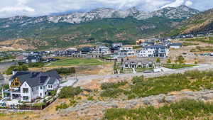 Birds eye view of property featuring a mountain view