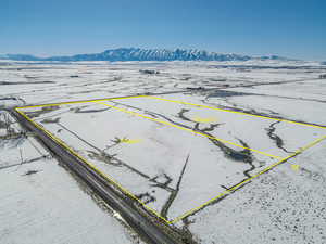 Snowy aerial view with a mountain view