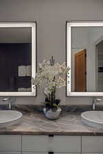 Full bathroom with double vanity